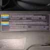 GMT800 AC refrigerant information label (R-134a) installed on a 2002 Chevrolet Tahoe under-hood shroud