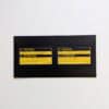 Two-piece GMT Central reproduction set with GM 12565610 transfer case caution and 12567697 AWD warning labels