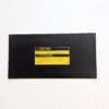 Actual GMT Central reproduction of GM 12567697 bilingual AWD warning label