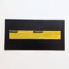 GMT Central reproduction of GM 15772975 bilingual front torsion bar adjustment warning label